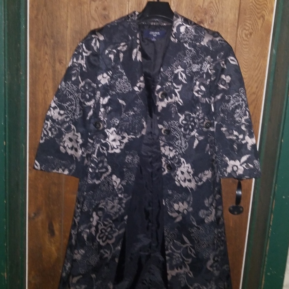Jones wear dress jacket.